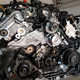 Timing belt and cam gears off, t-stat housing and water pump on. I love shiny new parts.